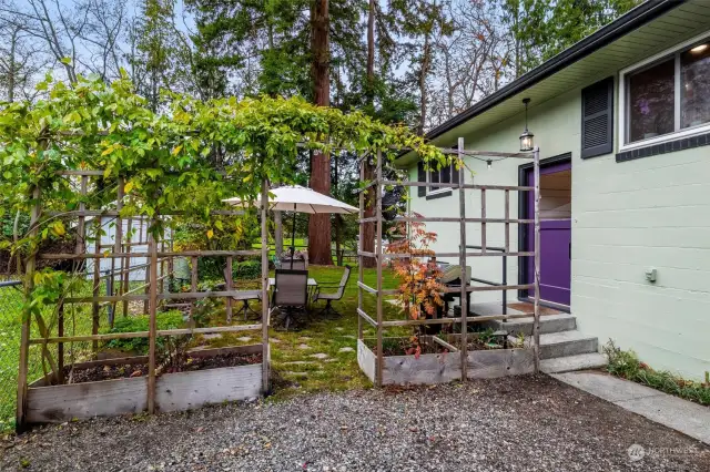 Perfect side yard for enjoying the afternoon and listening to the sound of the gurgling creek in back.