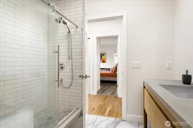 Custom tiled shower is sure to please.