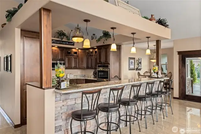 Beautiful "broken-edge" granite eating bar.