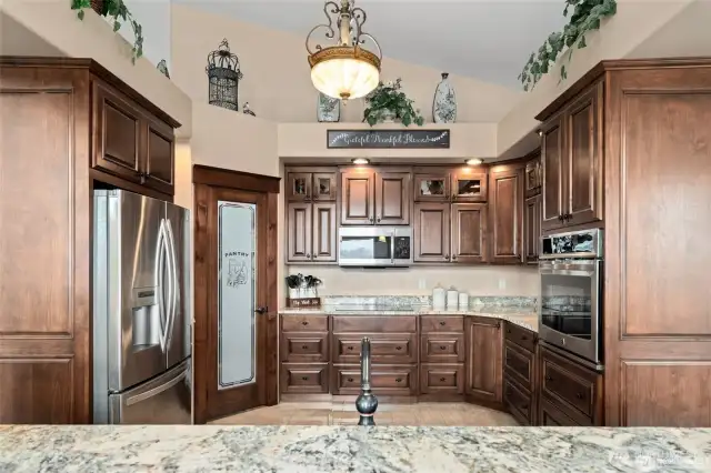 Gorgeous kitchen with custom made Alder cabinets.