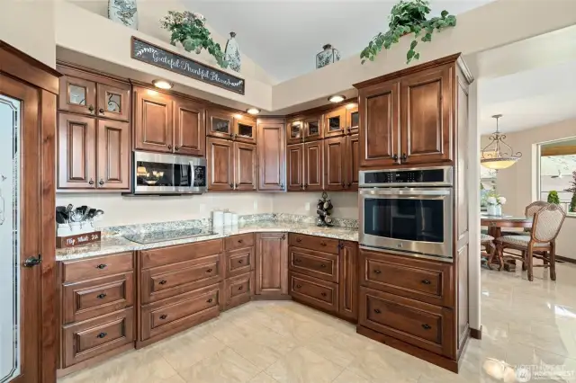 Another view of the kitchen, with breakfast nook to the right.