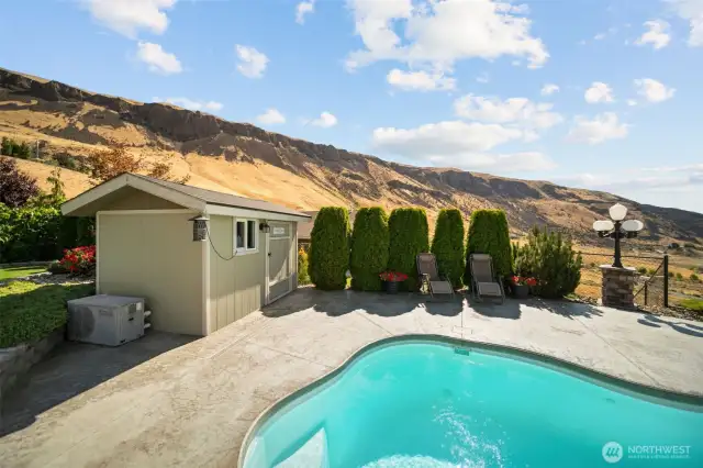 Pool with pump house.