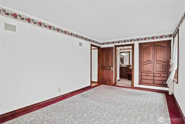 One of two upper level primary suites