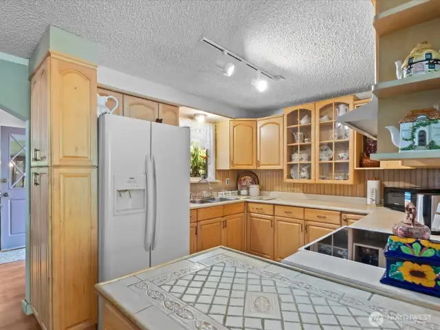 Kitchen Overlooks Fully Fenced backyard