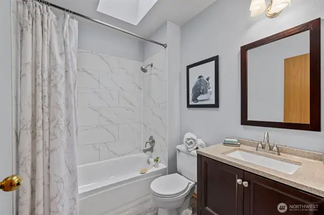 Guest Bath with Tile Shower Surround & Newer Vanity!