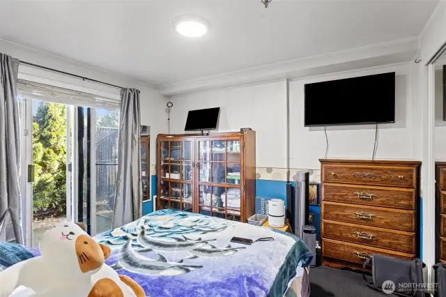 Bedroom with access to private patio