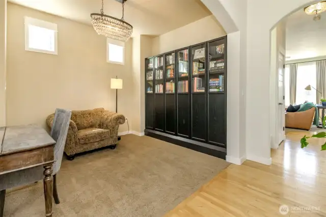Cozy entry perfect for home office or reading area with built in bookshelf.