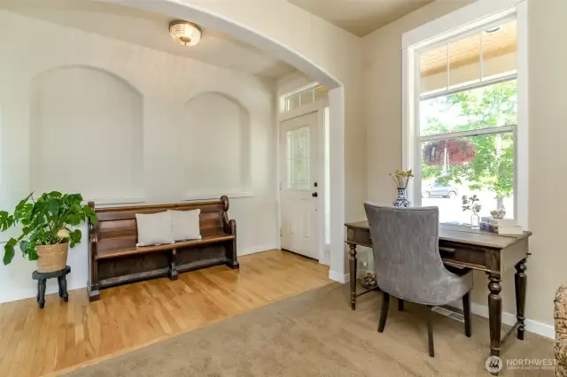 Grand entry with large windows letting in all that natural light. Tall ceilings add to that light and bright ambiance!