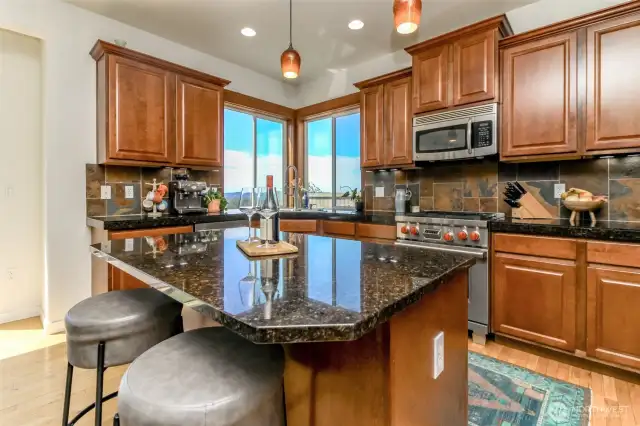 Refined kitchen is large with room for everyone