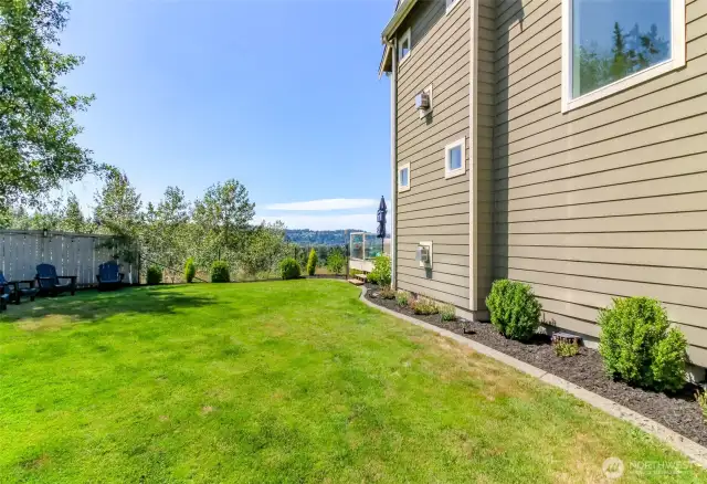 Side yard is fenced and private perfect for outdoor games