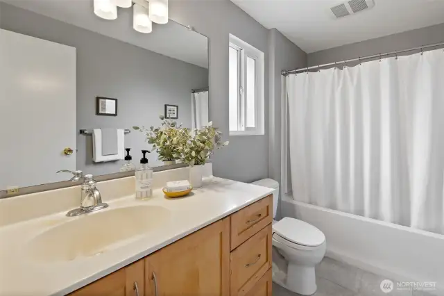 Full bath in primary bedroom.
