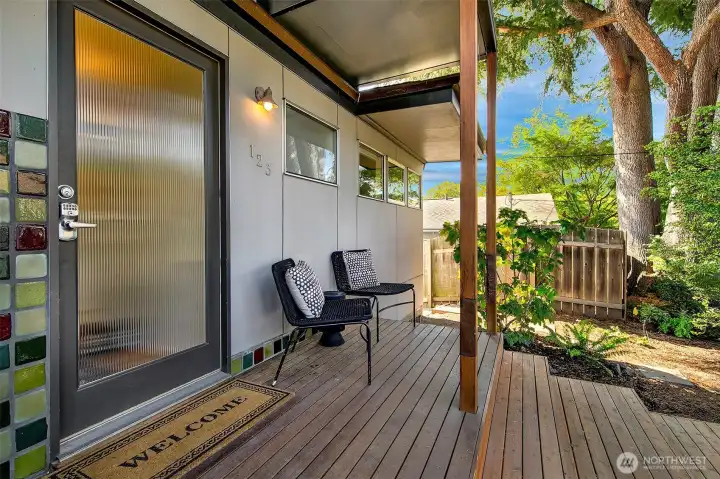 Roomy covered sitting porch at the front door!