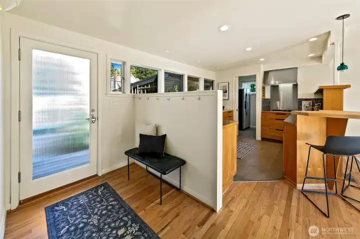 Entry foyer. Newly refinished hardwood floors throughout the main level.