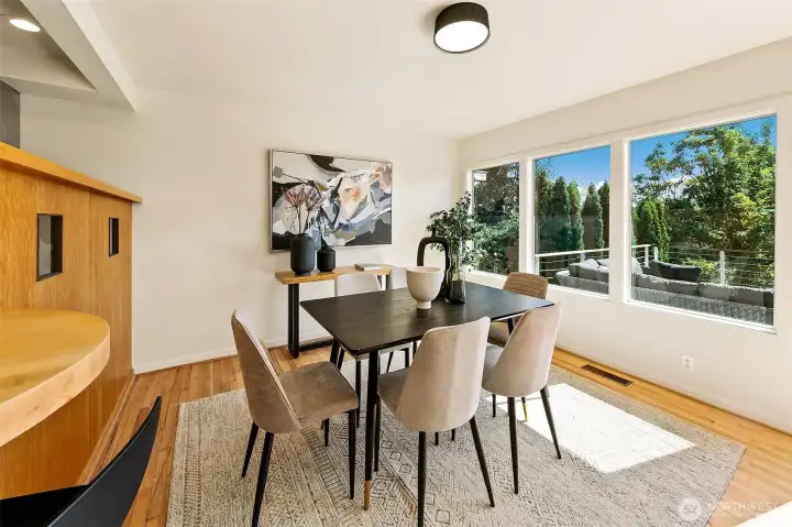 Dining room adjacent to the kitchen allows for great conversation while entertaining & cooking up a meal.