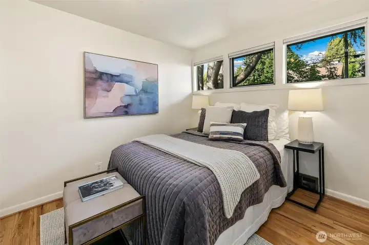 This main floor bedroom also functions well as a home office.