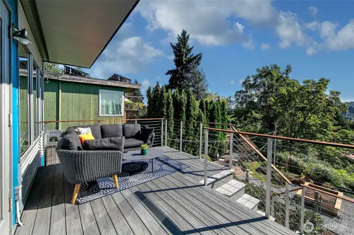 This amazing deck is off the dining room, and overlooks the mature garden.