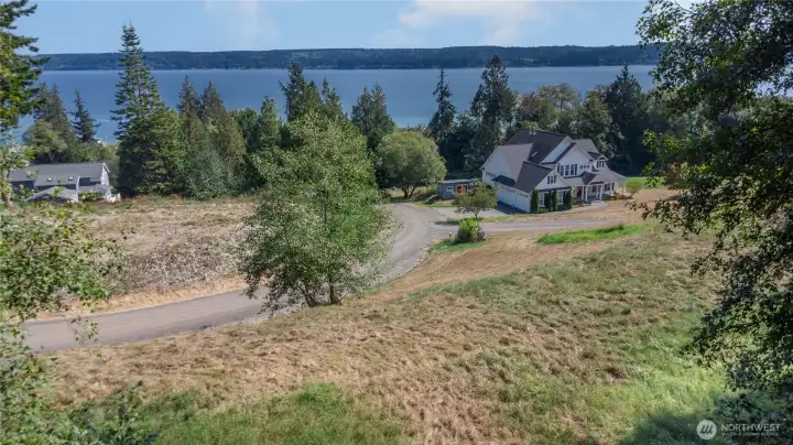 Lot 2 has beautiful, 180 degree siews of the Hood Canal, Kitsap Peninsula and Cascade Mountain Range. With cable and power on the street, access to Bridgehaven Water, and a community drain field connection.