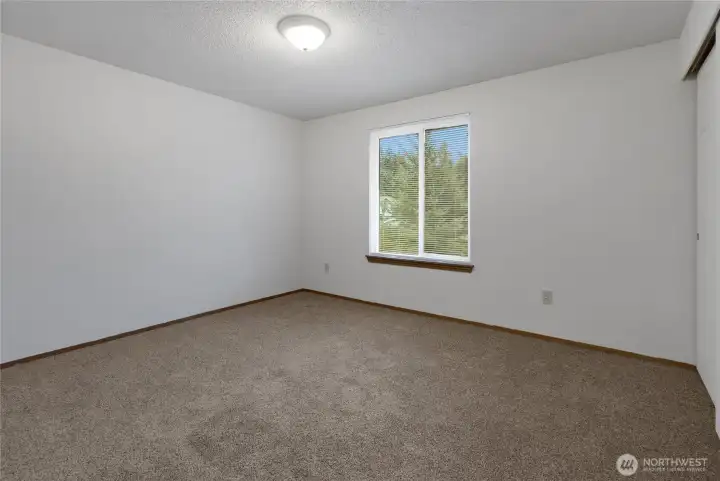 (3rd) bedroom offers brand-new carpeting and generous closet space