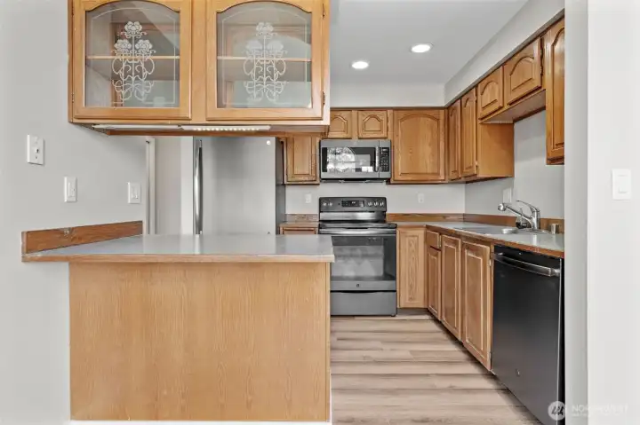 Etched glass display cabinet adding a touch of character.