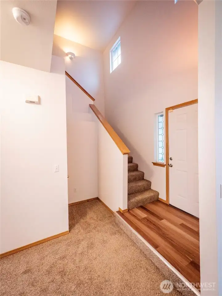 ENTRY AREA...COAT CLOSET UNDER STAIRWAY