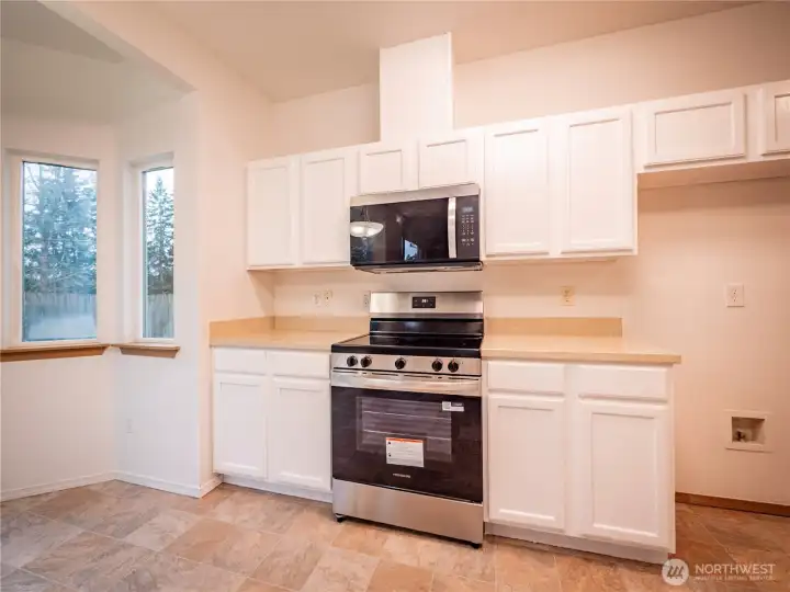 PLENTY OF STORAGE AND NEW STOVE AND MICROWAVE