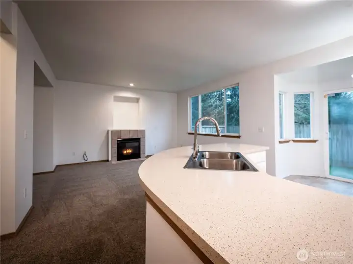 FROM THE GARAGE DOOR LOOKING INTO LIVING AREA/KITCHEN