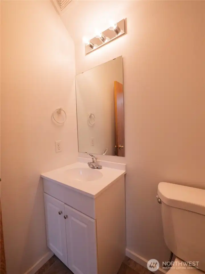 HALF BATH ON MAIN...NEW VANITY AND COMMODE