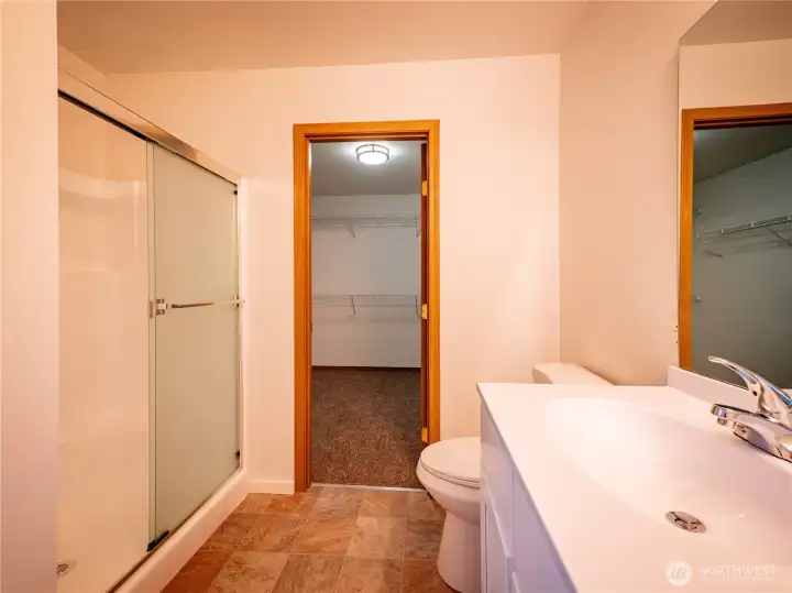 LOOKING TOWARD THE GIGANTIC WALK IN CLOSET