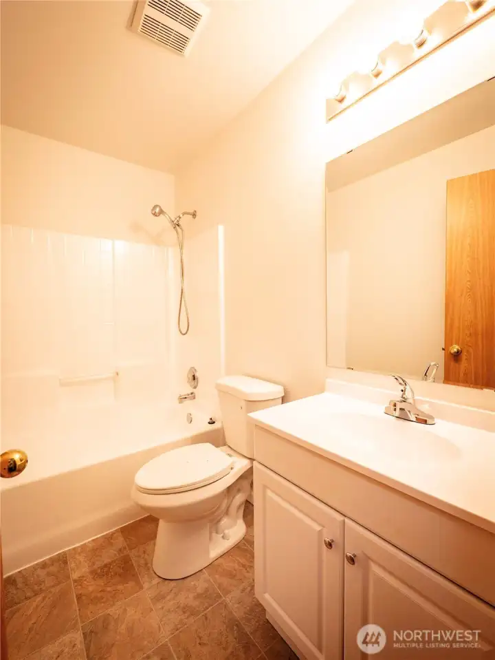UPSTAIRS BATH...NEW FLOORING AND VANITY