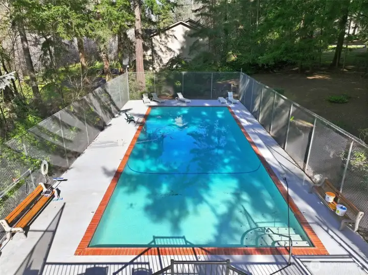 Heated pool just steps away from unit.