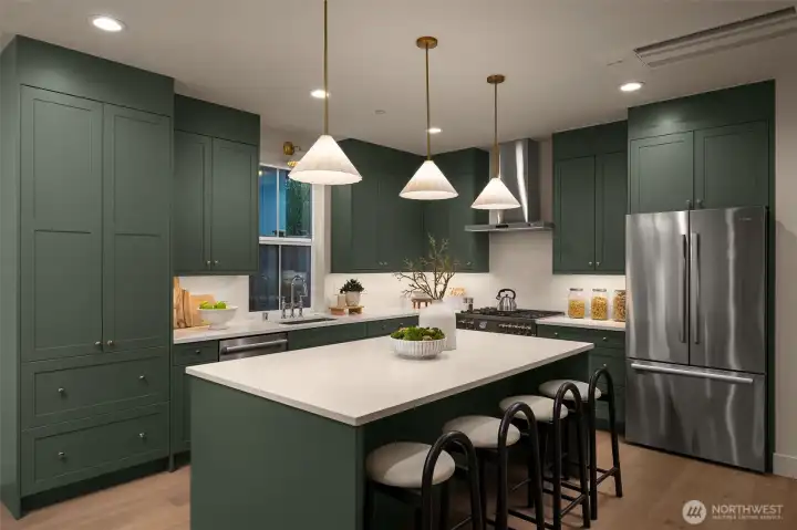 Kitchen featuring a premium stainless steel appliance package. featuring Bertazzoni Italia, Bosch, and Samsung