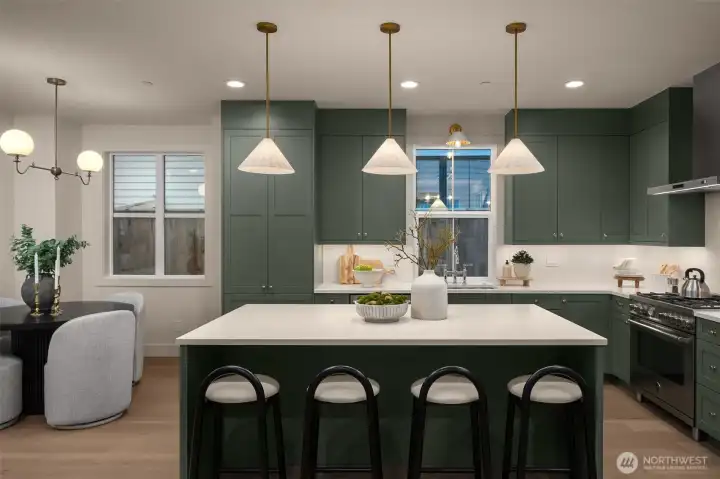 Chef's kitchen with quartz island and countertops.