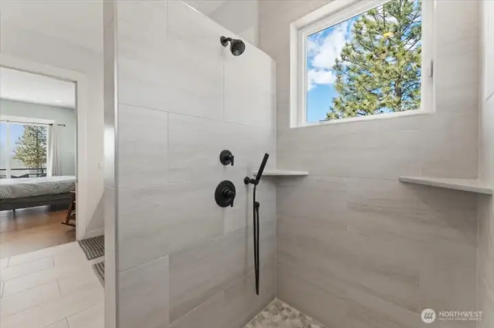 Floor to ceiling tiled shower