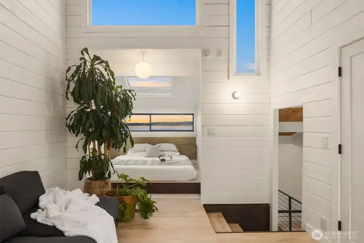 Welcome to this view cocoon designed as a peaceful sleeping sanctuary: vaulted ceilings, walk-in storage/closet, and spa bathroom.