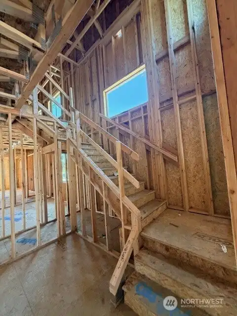 bright open stair case entry way