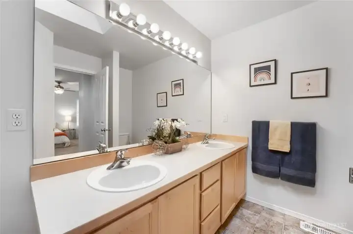 Double sink vanity in the primary bedroom