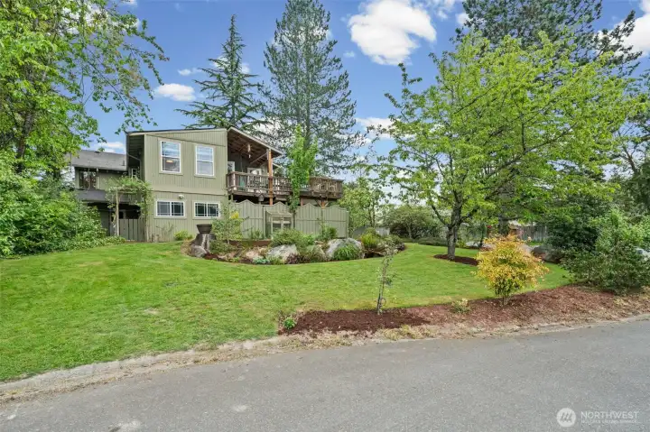 Cul-de-sac corner lot with mature landscaping and a spacious primary suite overlooking the yard.