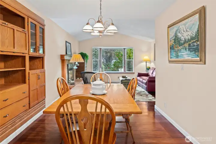 Open flow from dining to living room makes entertaining easy and comfortable.