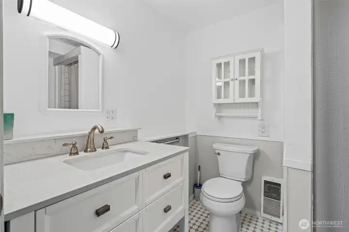 Updated downstairs ¾ bath with clean, modern touches.
