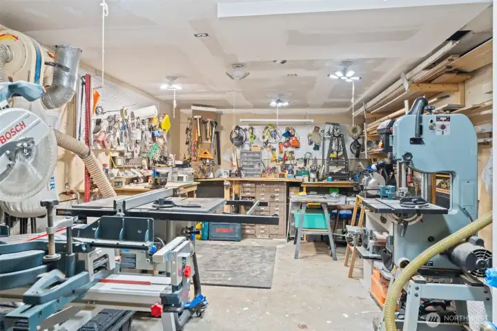 Heated workshop currently used for woodworking, ready for your next project or passion.