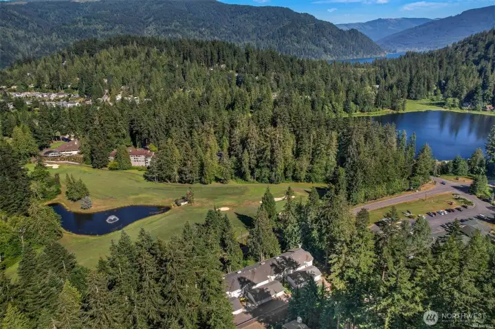 Overview of the Deer Creek Condominium's with Lake Louise and Lake Whatcom in the background.