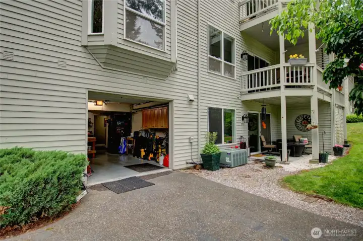 Attached single car garage located at the lower, rear access of the unit.