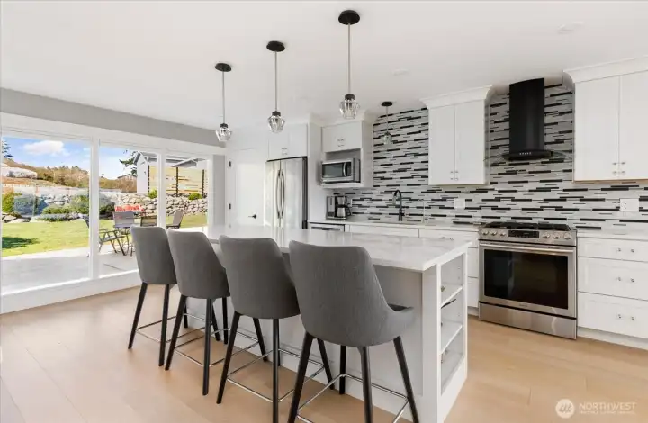 Main home Kitchen with views to back patio.