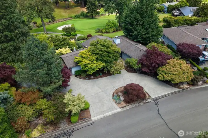 Circular driveway for easy access to the front door & garage.