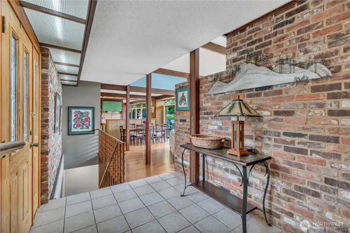 Dramatic front entry with tile flooring.