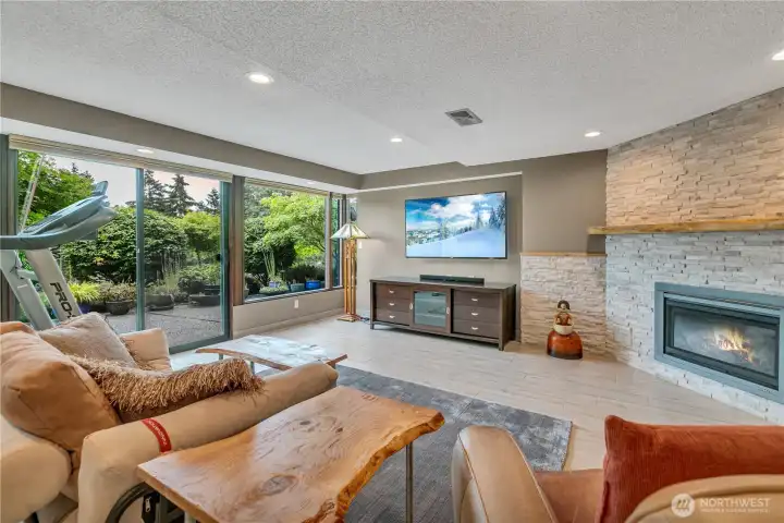 Enjoy your media, with slider leading to the back patio.