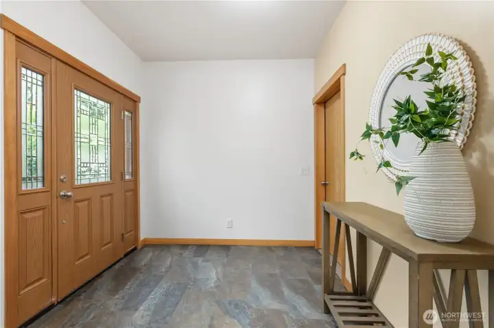 Spacious foyer offers room to welcome guests and serves as an inviting introduction to the home's interior. Spacious foyer offers room to welcome guests and serves as an inviting introduction to the home's interior.