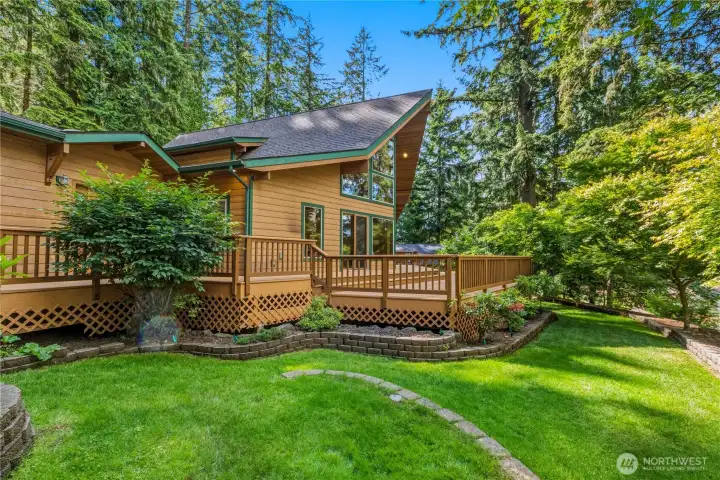 Established trees and greenery provide a sense of privacy and a peaceful Pacific Northwest atmosphere. Established trees and greenery provide a sense of privacy and a peaceful Pacific Northwest atmosphere.