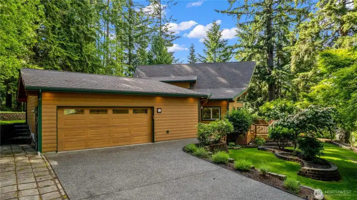 Spacious garage offers convenient parking, storage, and direct access to the home. Spacious garage offers convenient parking, storage, and direct access to the home.