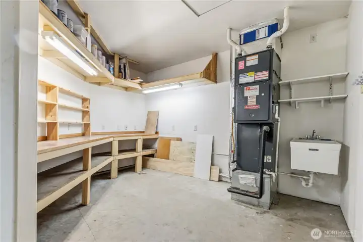 Attached workshop provides room for projects, storage, crafts, or home maintenance needs. Attached workshop provides room for projects, storage, crafts, or home maintenance needs.